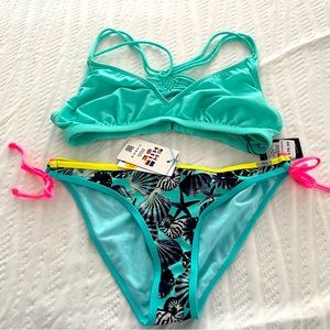 Woman’s bikini swimsuit size XL. Super cute and New With Tags. Smoke free home.